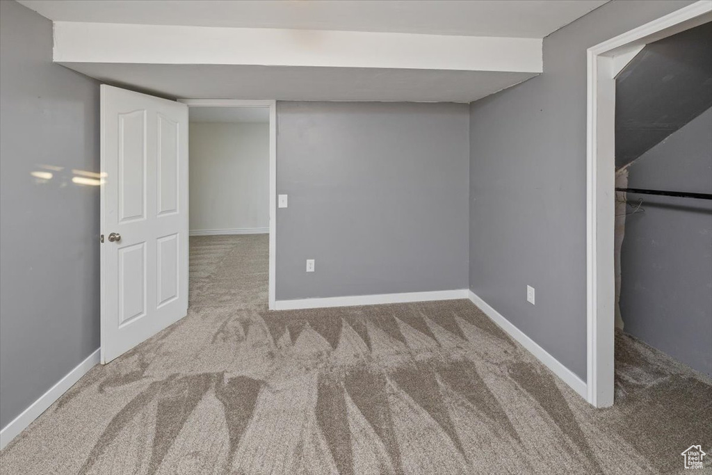 Basement with carpet floors