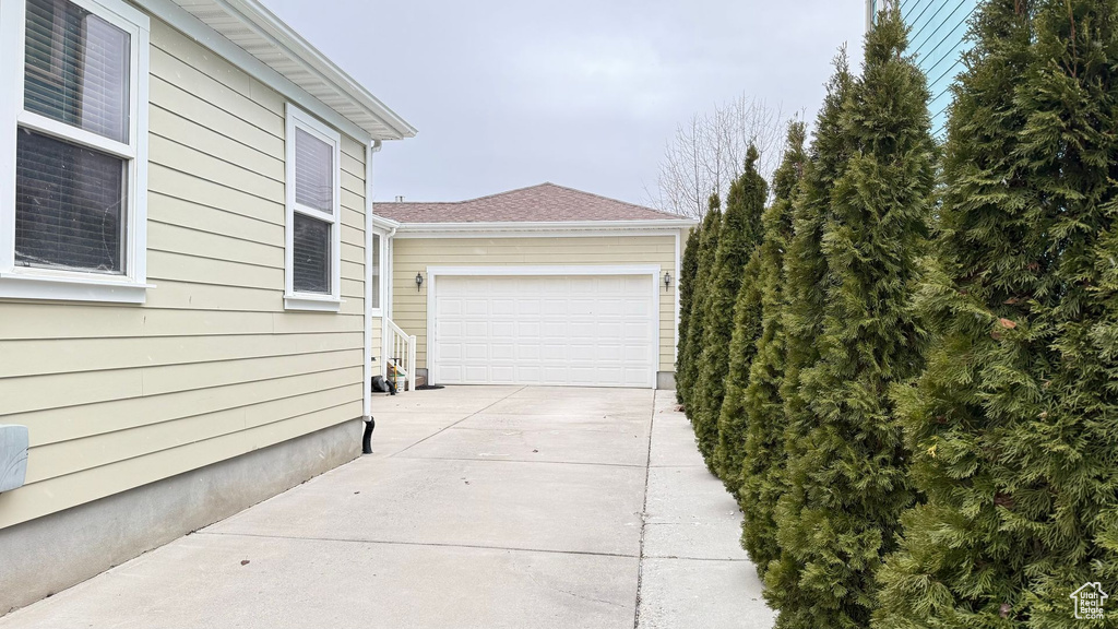 Exterior space with a garage