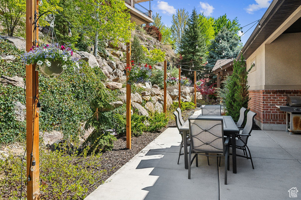 View of patio / terrace with area for grilling and outdoor dining space
