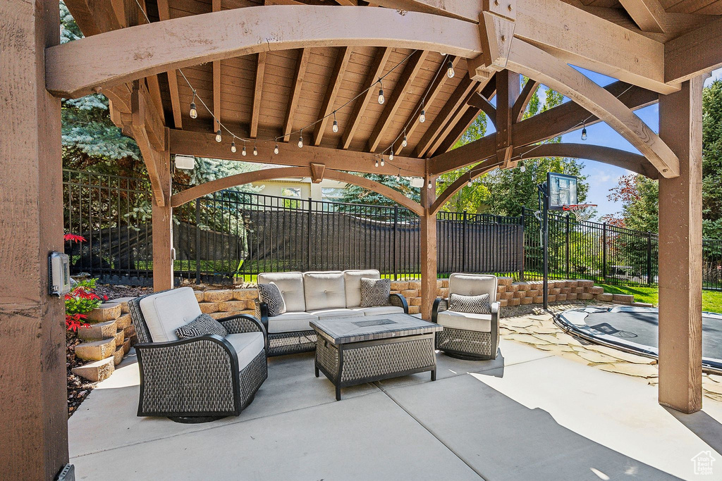View of patio / terrace with outdoor lounge area and fence