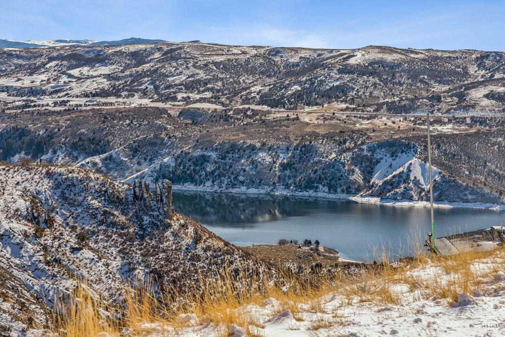 View of mountain backdrop with a large body of water