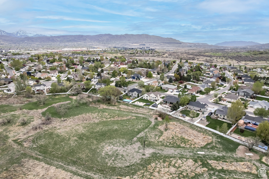 Birds eye view of property featuring a residential view and a mountain view