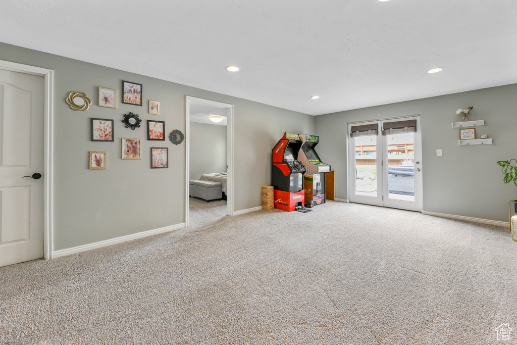 Playroom featuring baseboards, recessed lighting, and carpet