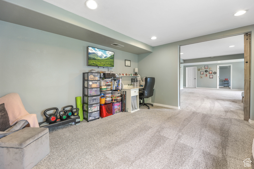 Office area with baseboards, carpet flooring, and recessed lighting