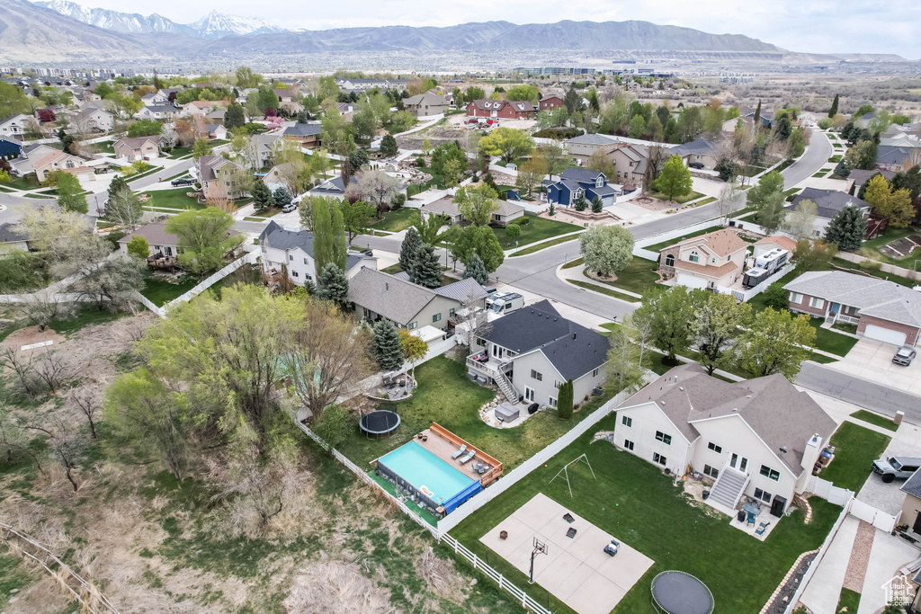 Birds eye view of property featuring a residential view and a mountain view