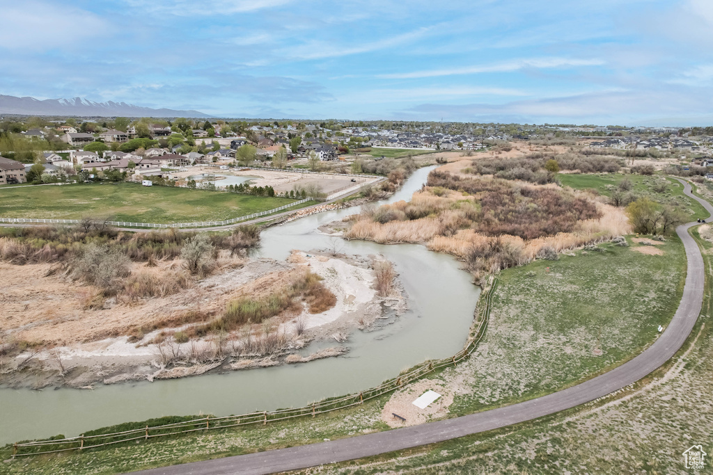 Aerial view with a water and mountain view and a residential view