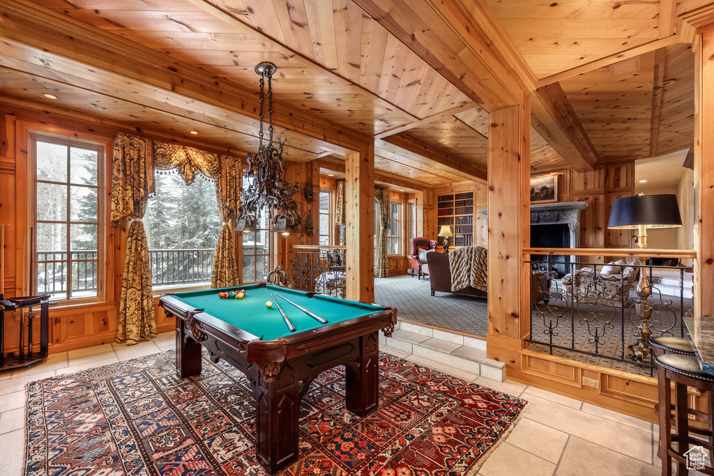 Game room with wood ceiling, a fireplace, billiards, and tile patterned floors