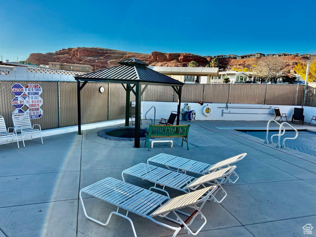 View of patio / terrace featuring a gazebo and a mountain view