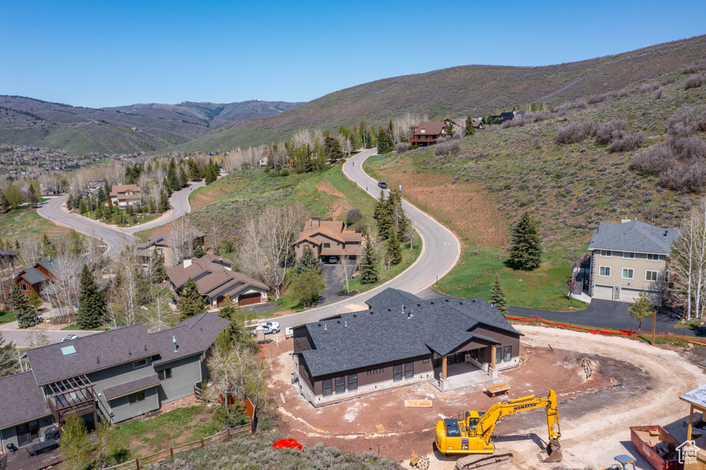 Aerial view of residential area with a mountainous background