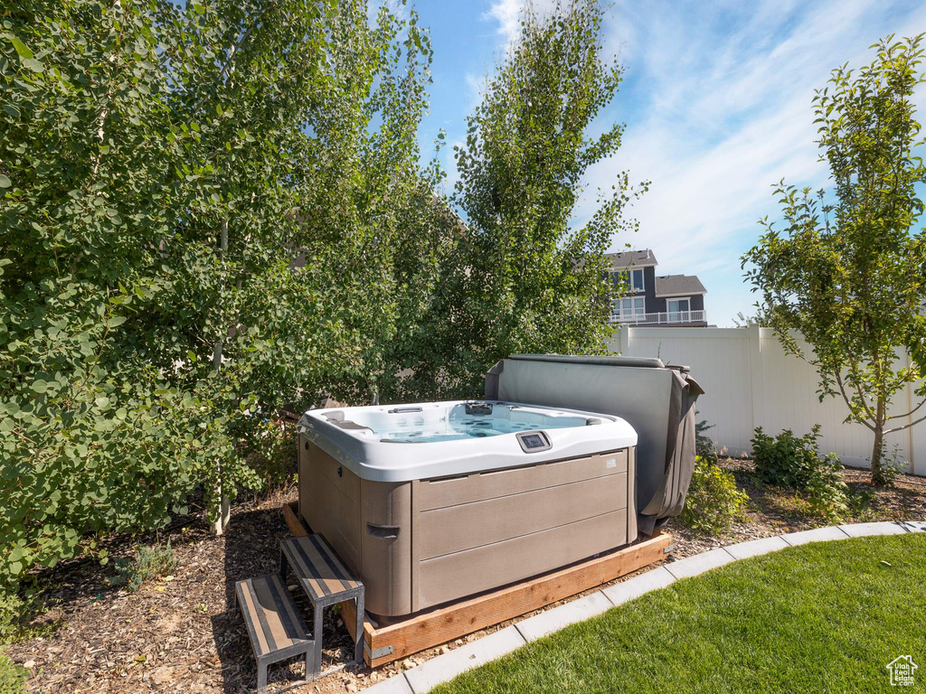 View of yard featuring a hot tub