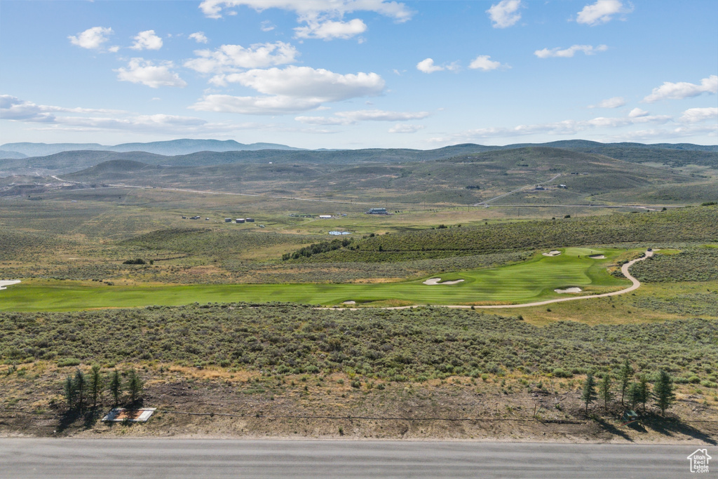 View of mountain background with a golf club