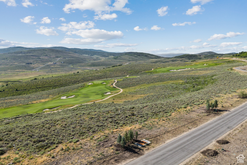 View of mountain background featuring a golf club