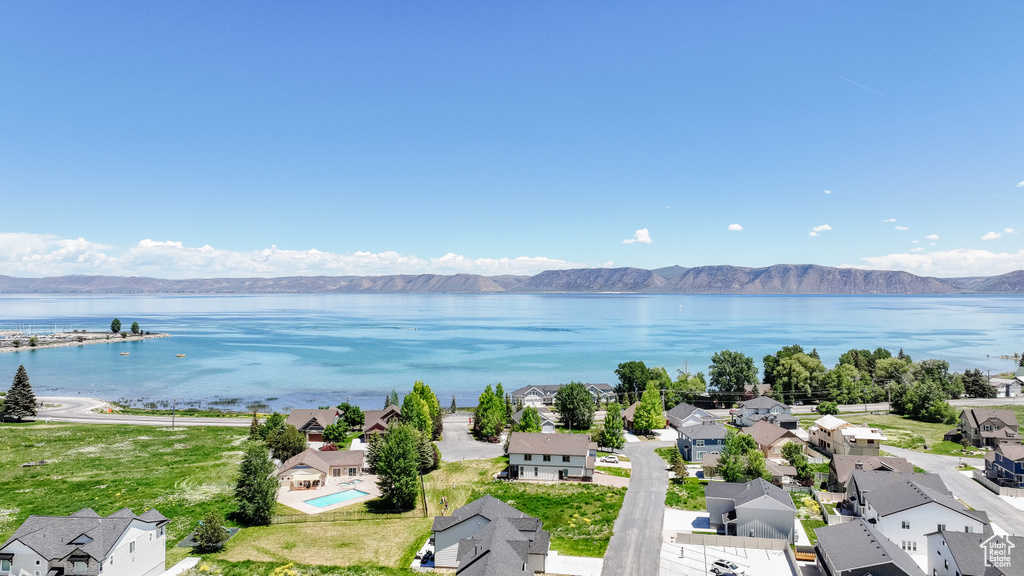 Aerial view of residential area with a water and mountain view