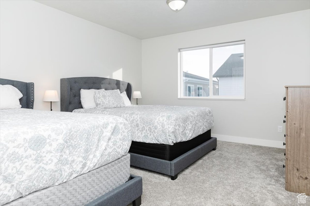 Bedroom featuring carpet flooring