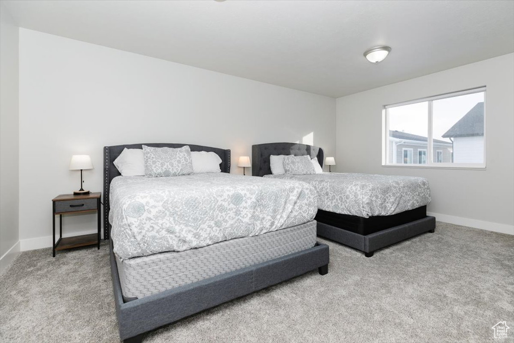 Bedroom featuring carpet floors