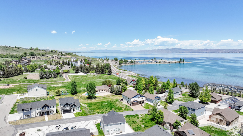 Aerial view of residential area with a nearby body of water