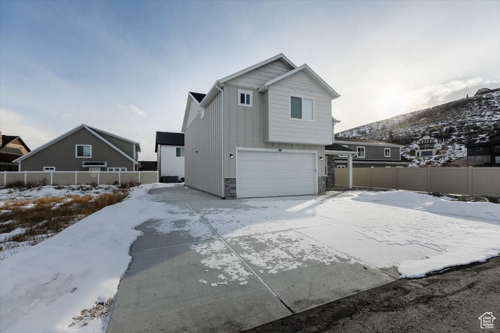 View of front of house with a garage