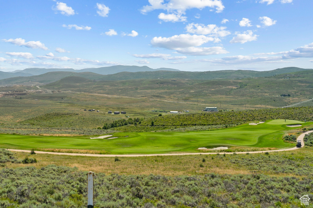 View of mountain backdrop with a golf club