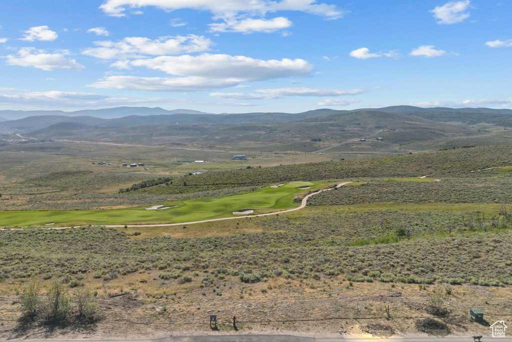 View of mountain backdrop with a golf club