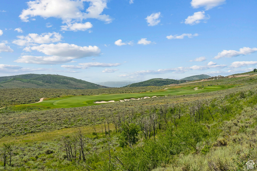 View of mountain background featuring a golf club