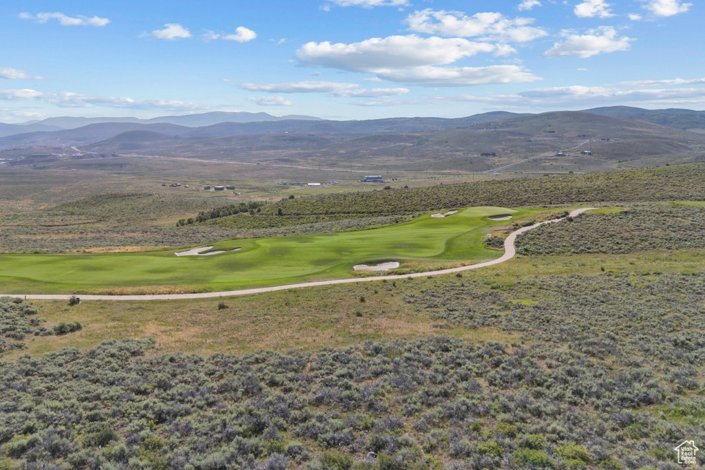 View of mountain background with a golf course