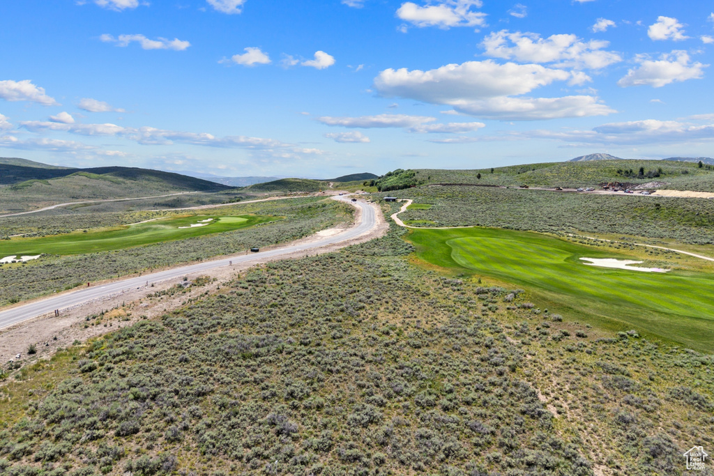 View of street with a mountain view and golf course view