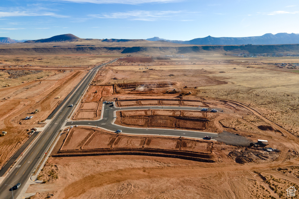 Birds eye view of property with a mountain view