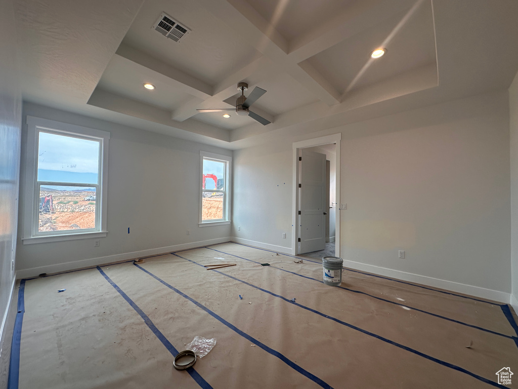 Unfurnished bedroom featuring coffered ceiling, recessed lighting, a ceiling fan, and beam ceiling