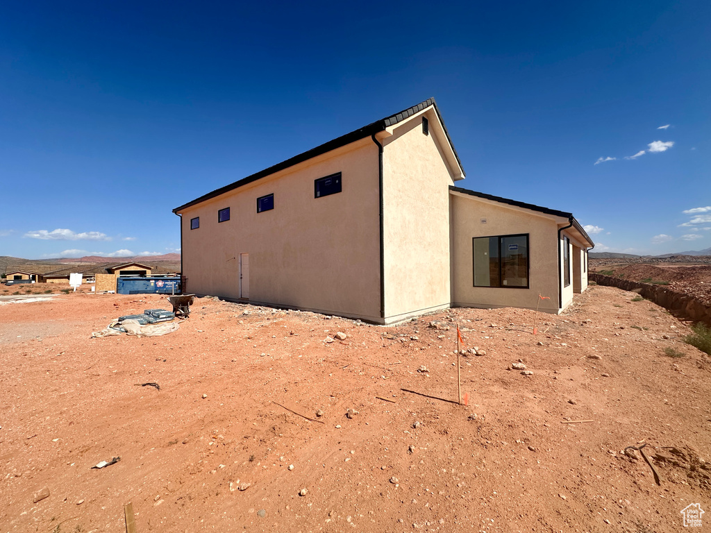 View of property exterior featuring stucco siding