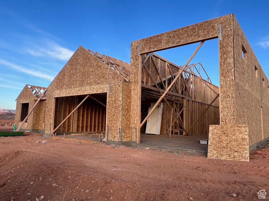 Exterior space with a garage and an outdoor structure