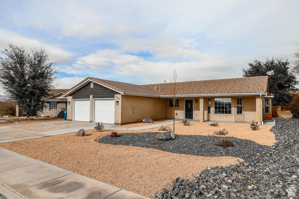 Single story home featuring a garage