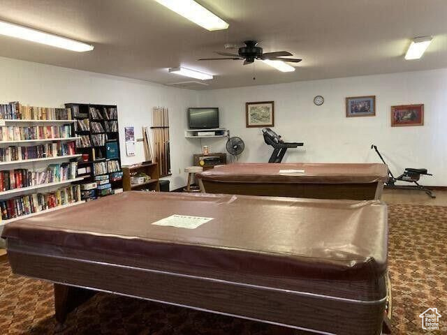 Recreation room featuring ceiling fan and pool table