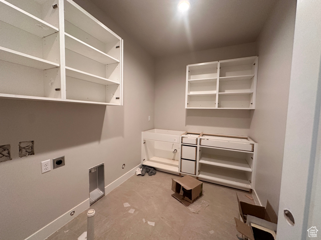 Laundry room featuring hookup for a gas dryer and electric dryer hookup