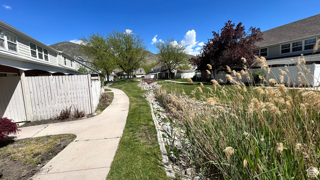 Exterior space with fence and a residential view