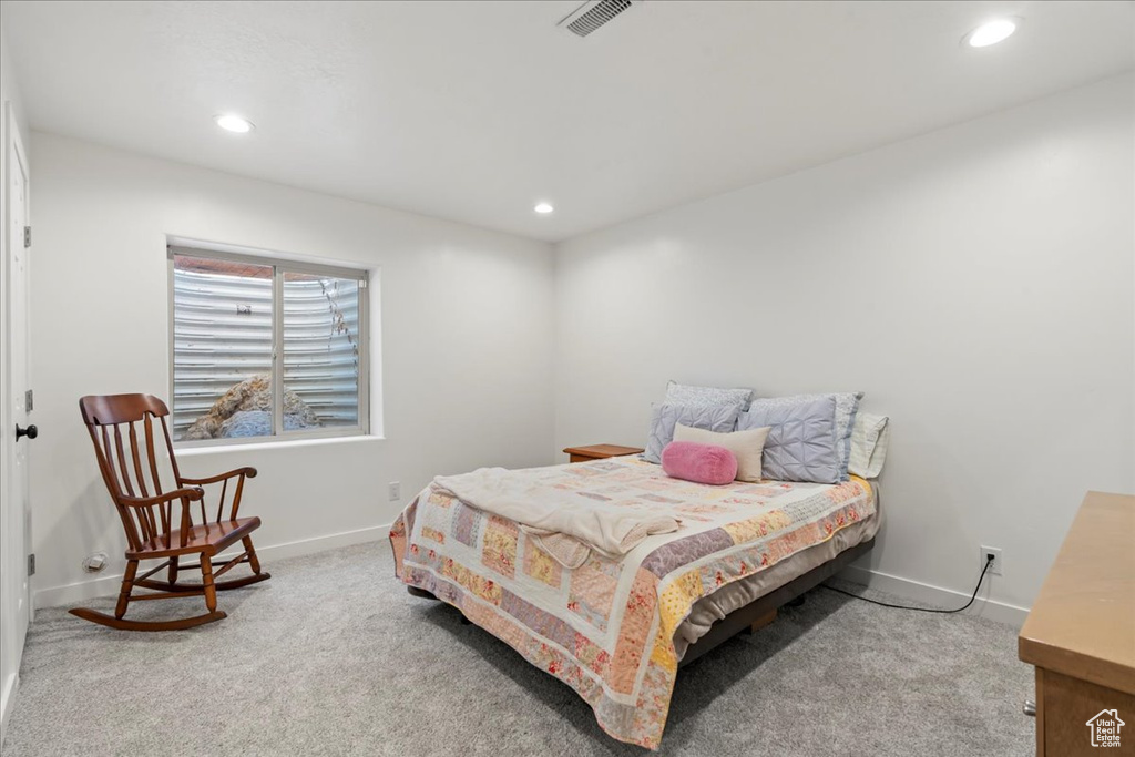 Bedroom featuring carpet flooring