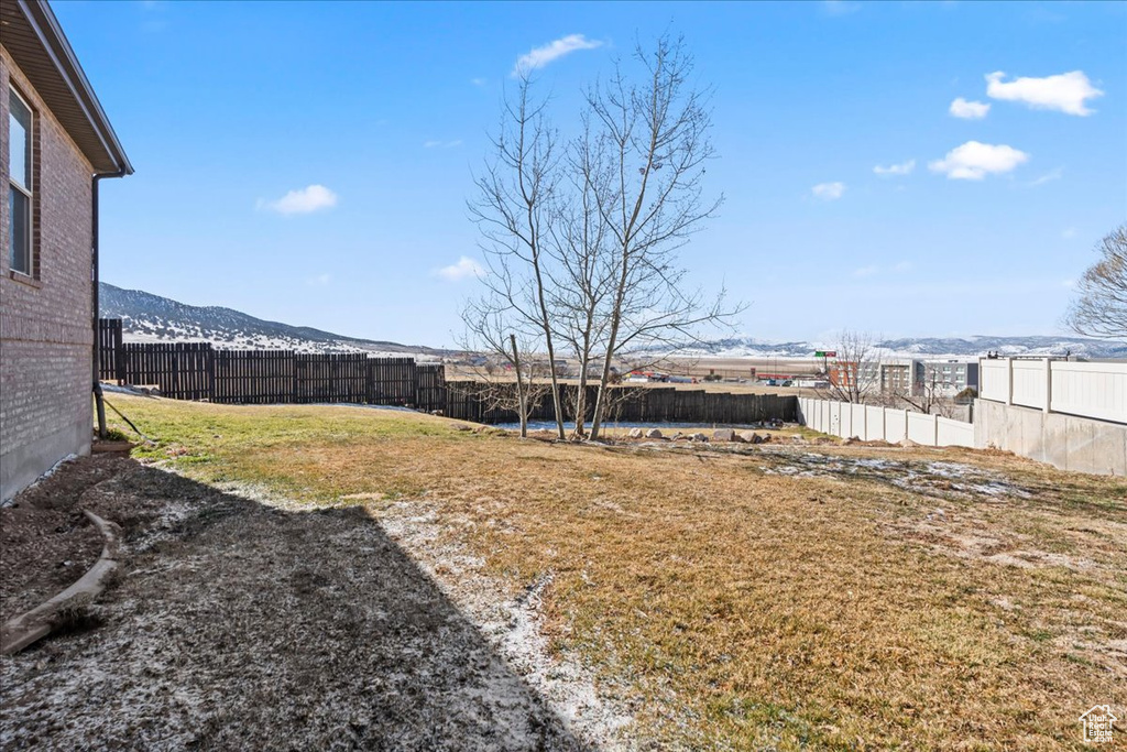 View of yard featuring a mountain view