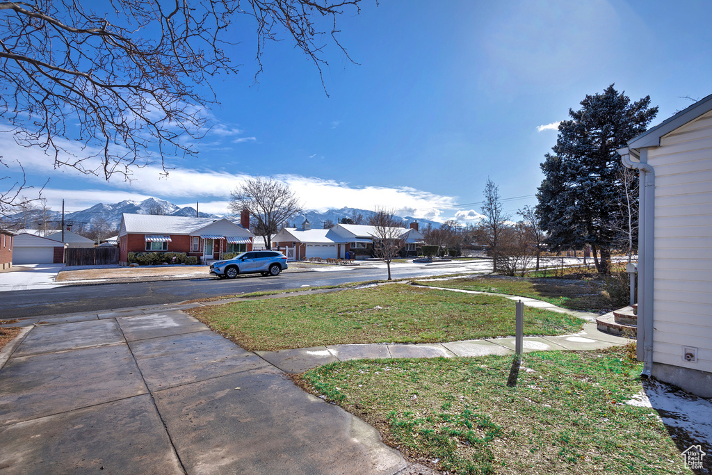 View of yard with a mountain view