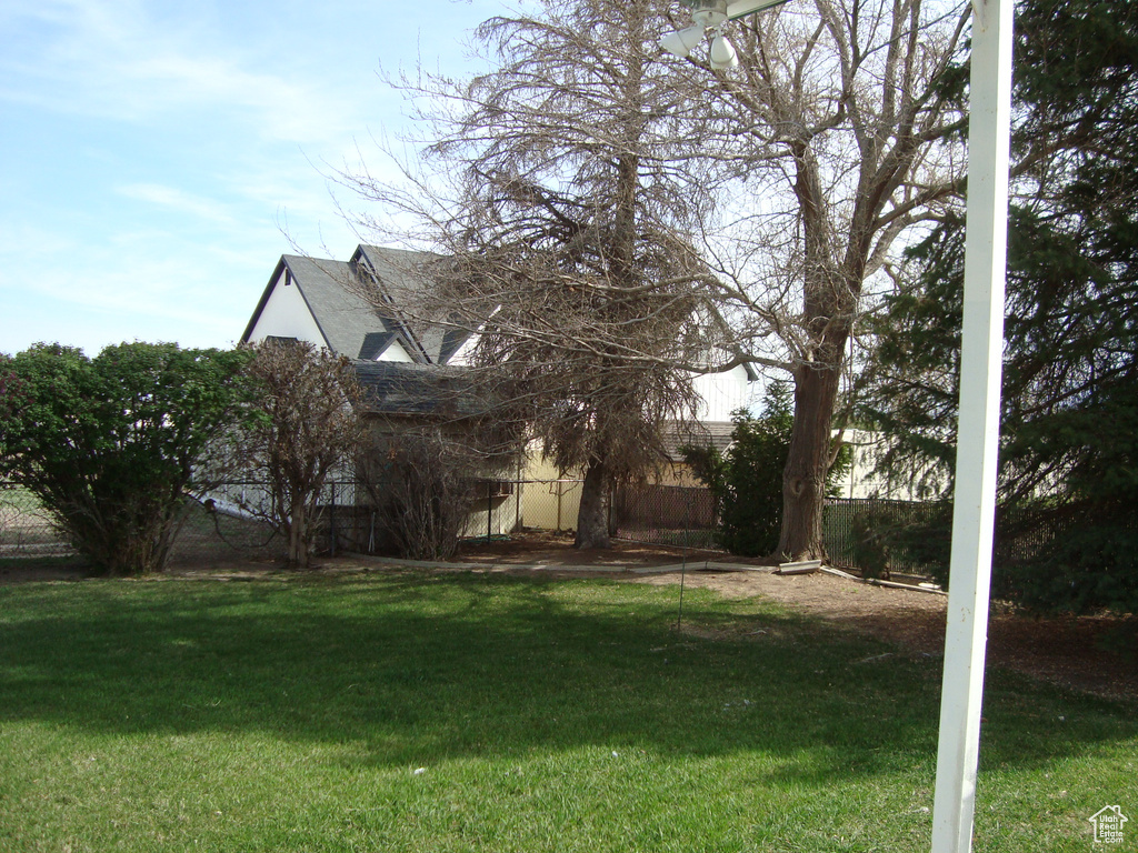 View of yard featuring fence