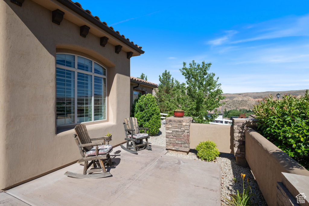 View of patio / terrace featuring a mountain view