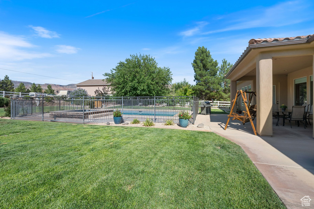 View of yard with a patio