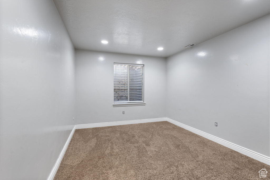 View of carpeted spare room