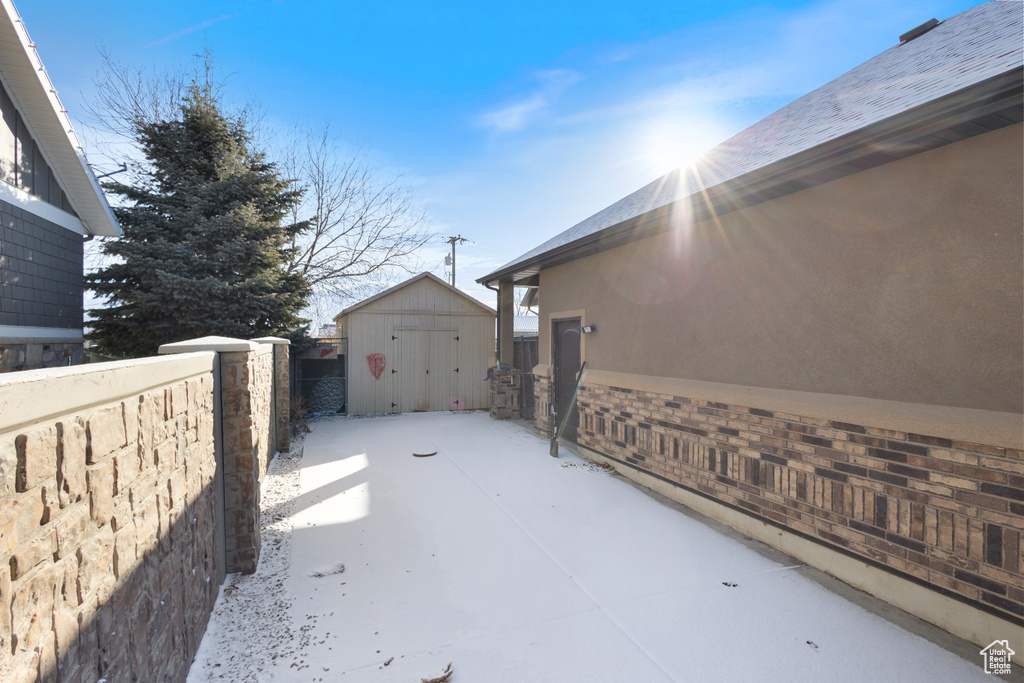 Exterior space with a shed