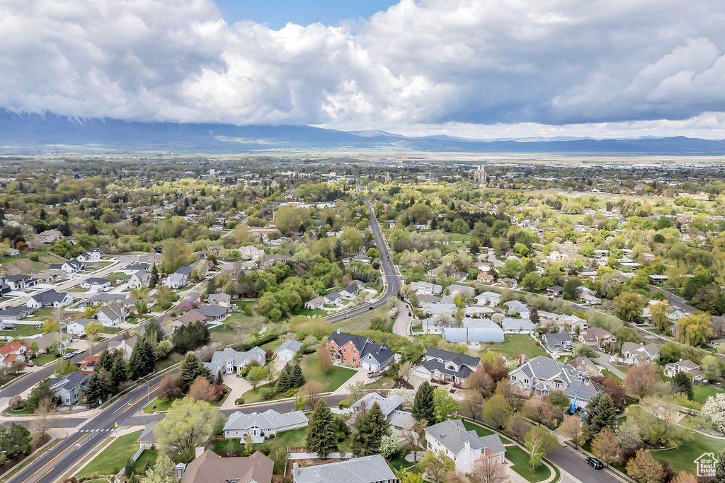 Drone / aerial view with a residential view and a mountain view