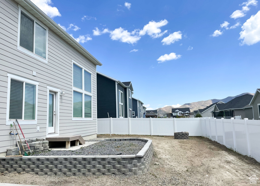 View of yard with a residential view and a fenced backyard