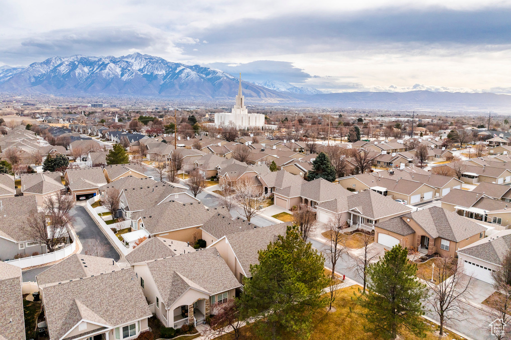 Aerial view of residential area with a mountain backdrop