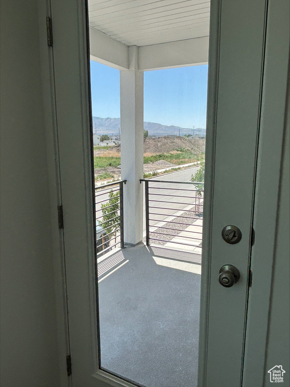 Balcony featuring a mountain view