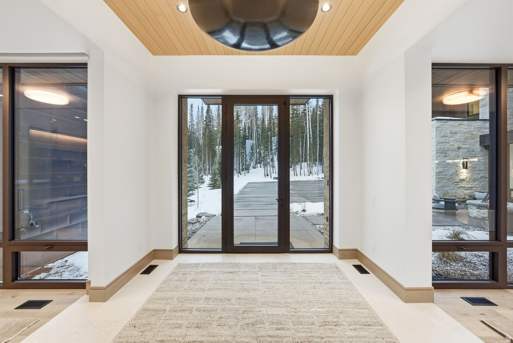 Doorway to property featuring french doors
