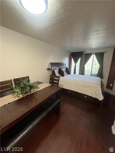 Bedroom featuring wood finished floors