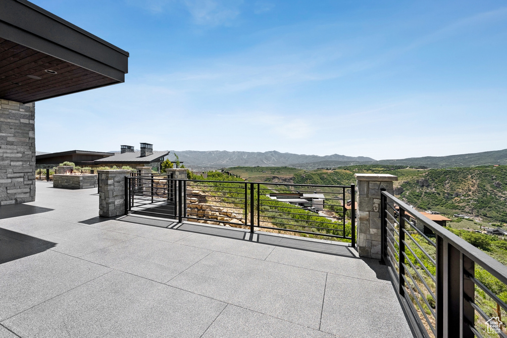 Patio / terrace with a mountain view