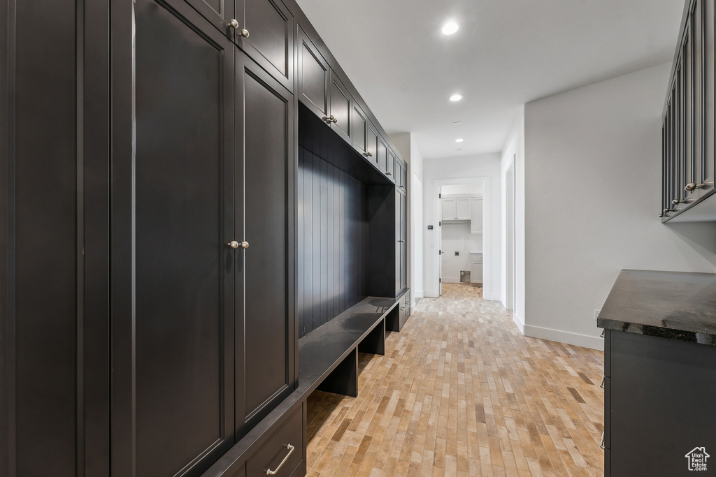 Mudroom with recessed lighting and light wood finished floors